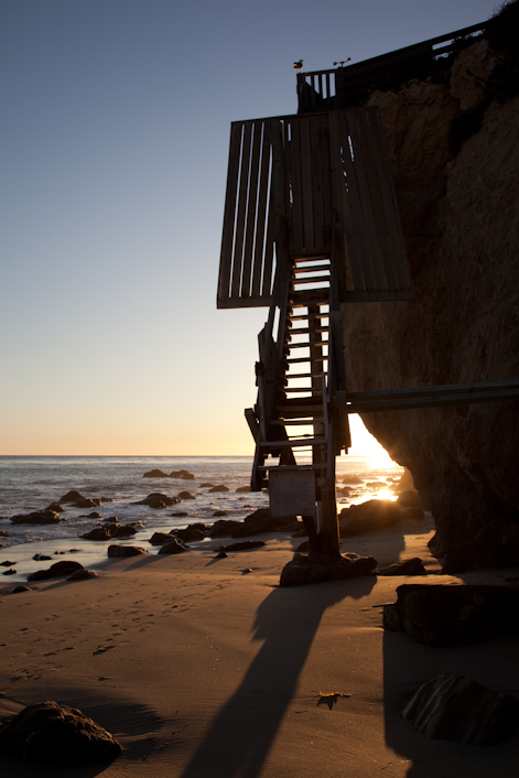 Stairs to someone's lucky house dip down to El Matador beach