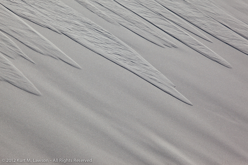 Soft Sand Avalanches